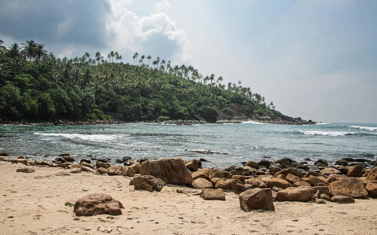 Secluded Mirissa beach scene for south coast base selection guidance